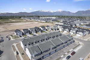 Birds eye view of property featuring a residential view and a mountain view