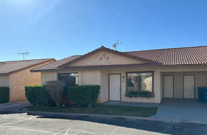 View of front of property with stucco siding