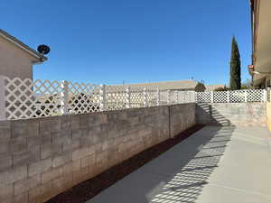 View of patio / terrace featuring fence