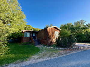 View of front facade with a front lawn