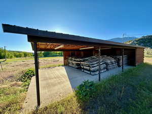 View of stable with a mountain view