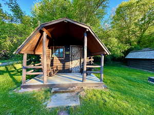 Exterior space featuring an outbuilding