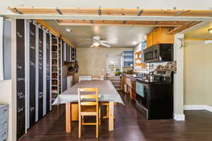 Kitchen with one of a kind pantry storage system (labels are in chalk marker and easily erased)