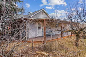 Wrap around porch on north and east sides of the home