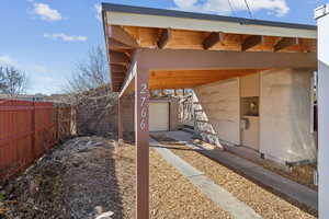 Carport and oversized garage