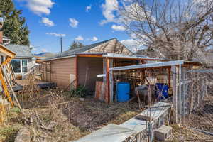 Oversized garage, with additional storage out back