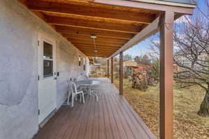 Wrap around porch on north and east sides of the home