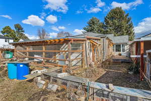 Secure area for chicken coop, and tunnel for chickens to get to the food forest - they help with weeds and insects!