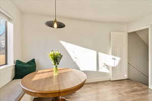 Dining area featuring light wood-style floors