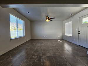 Interior space featuring a wealth of natural light, visible vents, and baseboards