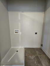 Laundry room with laundry area, baseboards, washer hookup, and hookup for an electric dryer