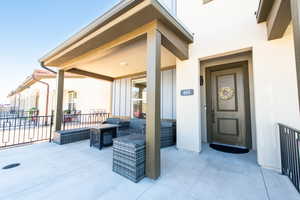 View of patio with an outdoor living space