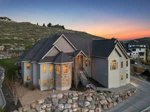 View of front of house featuring stone siding