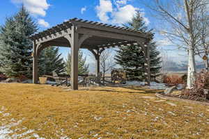 View of yard with a pergola