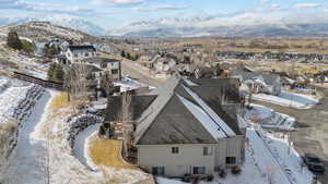 Snowy aerial view with a mountain view