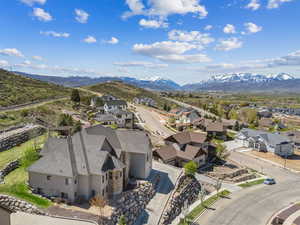 Birds eye view of property with a residential view and a mountain view