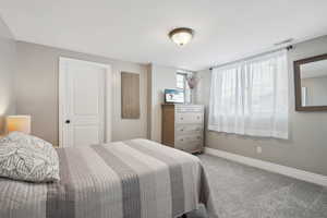 View of carpeted bedroom