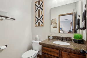 Bathroom with vanity and toilet