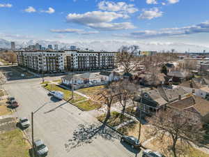 Birds eye view of property with a mountain view and a city view