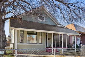 Front view facade with covered porch.