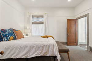 Master bedroom with recessed lighting