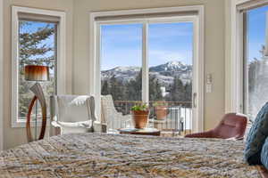 Bedroom featuring a mountain view