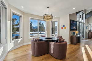 Dining space featuring recessed lighting, baseboards, and light wood finished floors