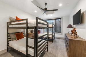 Carpeted bedroom featuring baseboards and recessed lighting