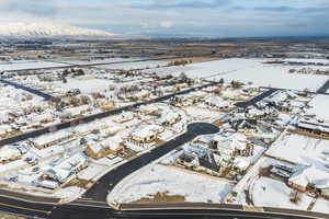 Snowy aerial view with a residential view