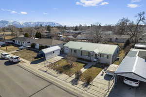 Aerial view featuring a residential view and a mountain view