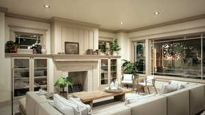 Interior space featuring ornamental molding, recessed lighting, and a brick fireplace