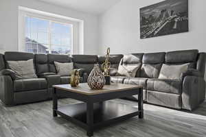 Living area featuring wood finished floors