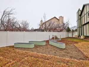 View of yard with a fenced backyard