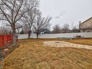 View of yard featuring a fenced backyard