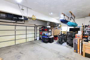 Garage featuring a garage door opener