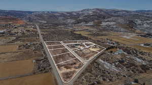 Drone / aerial view featuring a mountain view