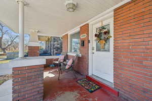 View of patio with covered porch