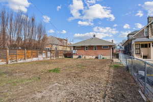 Private fenced  yard with a residential view