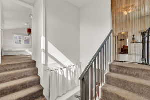 Staircase to back bedroom and basement