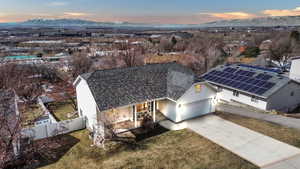 Birds eye view of property with a mountain view