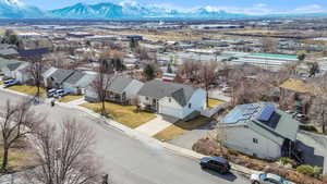 Drone / aerial view with a residential view and a mountain view