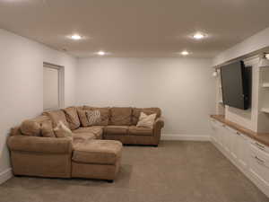 Living room with carpet floors