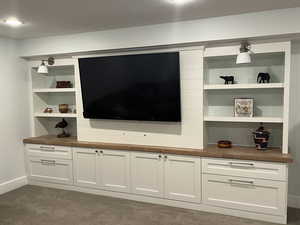 Built in Entertainment centerTV is included