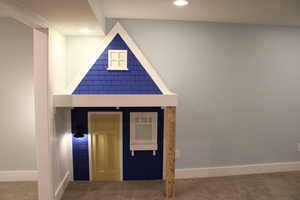 Interior space featuring carpet floors - play area