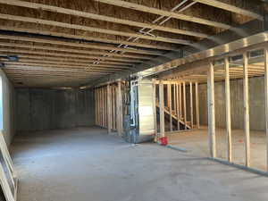Unfinished basement with heating unit