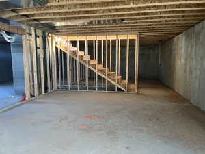 Unfinished below grade area with stairway