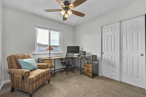 Bedroom 2 featuring a ceiling fan