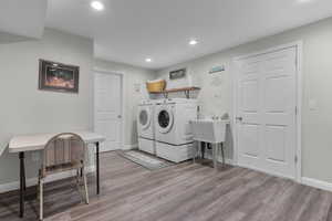 Large Laundry/sewing room featuring deep tub sink.