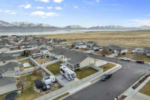 Bird's eye view with a residential view and a water and mountain view