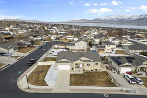 Bird's eye view with a residential view and a water and mountain view